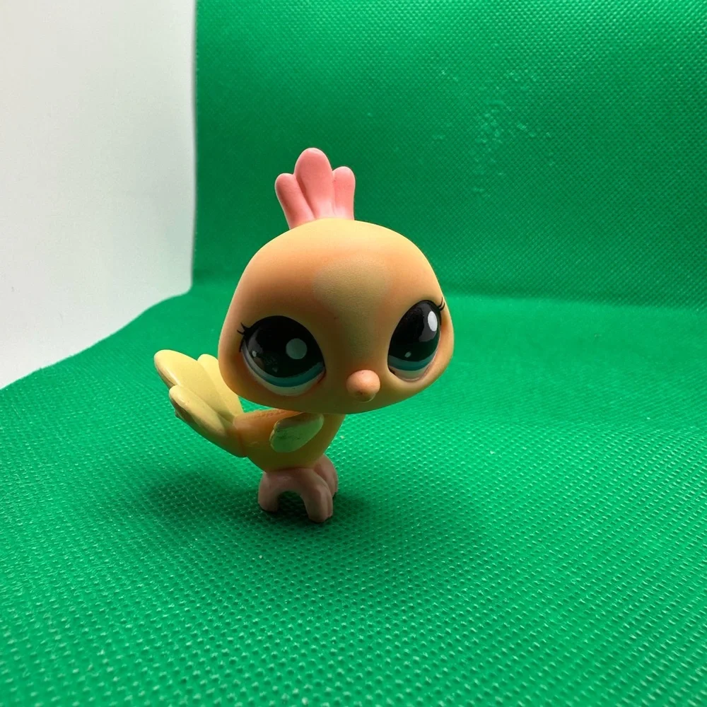 Orange and Yellow Pastel Peacock‎ Bird Littlest Pet Shop.  Guaranteed authentic